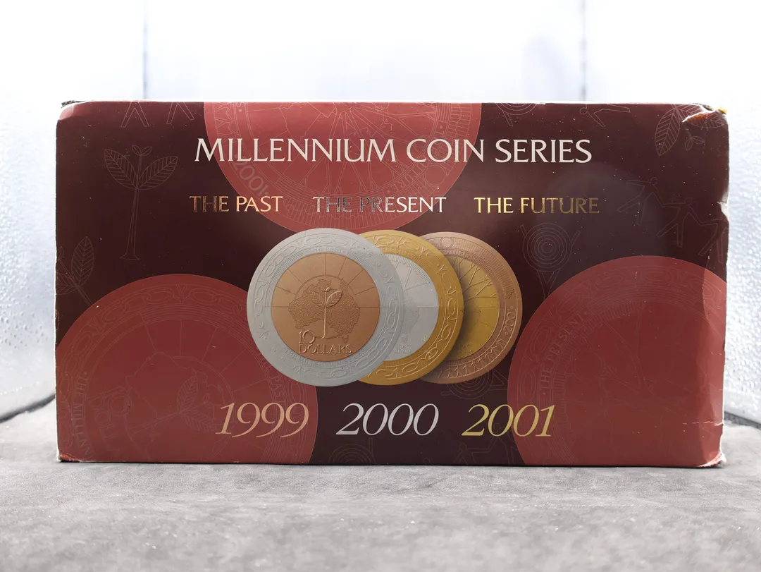 Lot 42 — 1999-2001 Millenium : The Past, The Present, The Future 3x $10 bimetallic proof collection