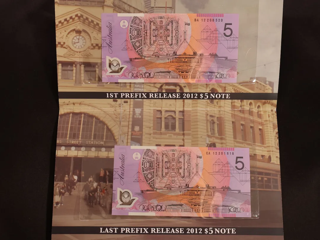 Lot 21 — ANDA 2013 Coin Fair Folder with 2012 $5 First and Last Prefixes BA12 and EA12