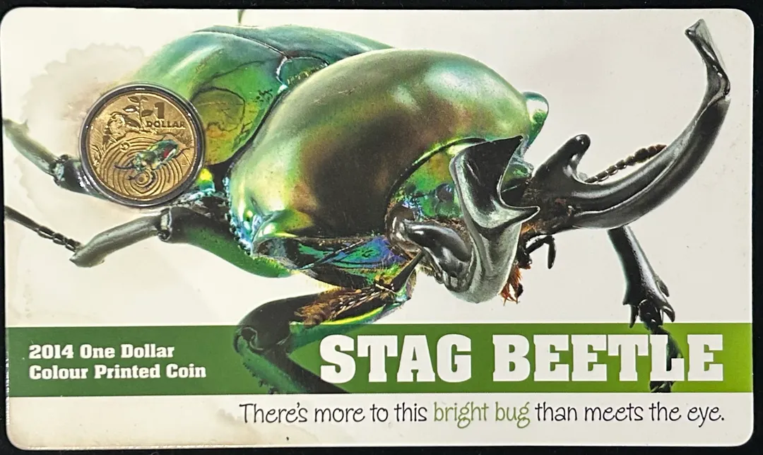 Lot 34 — 2014 $1 Stag Beetle Coloured Coin (Card Damaged/Stained)